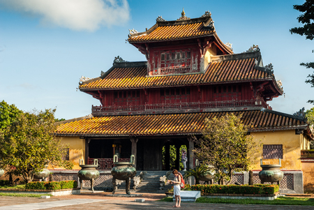 Hue, Vietnam -November 11, 2015: Pagoda with tourists standing in front of itのeditorial素材