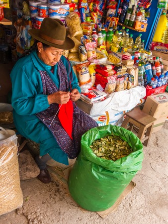 Cusco, Peru - December 13, 2011: Local woman offering Coca leavesのeditorial素材