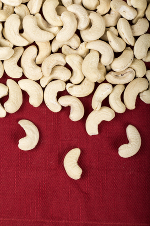 Cashew nuts in bowl on wood tableの写真素材