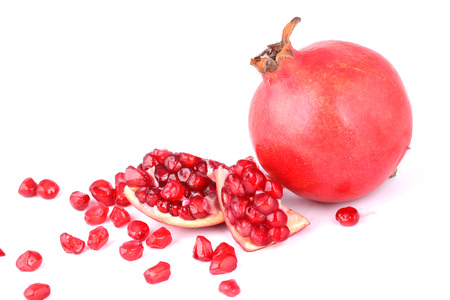 Ripe pomegranate fruit isolated on white background cutoutの写真素材