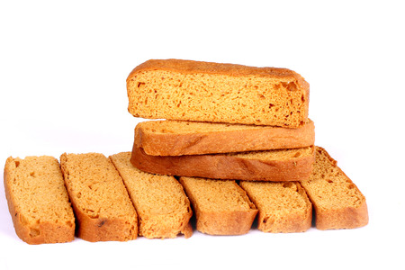 crispy rusk on white background