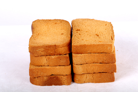 crispy rusk on white background