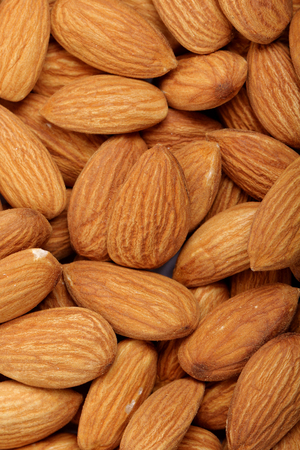 Almonds isolated. Group of almond nuts isolated on white background. Full depth of fieldの写真素材
