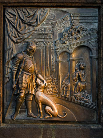 Photo of the ancient statue on the Charles bridge in Prague, Czech republic.From wiki: The avenue of 30 mostly baroque statues and statuaries situated on the balustrade forms a unique connection of artistic styles with the underlying gothic bridge. Most の写真素材