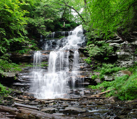 very large waterfall in a forestの写真素材