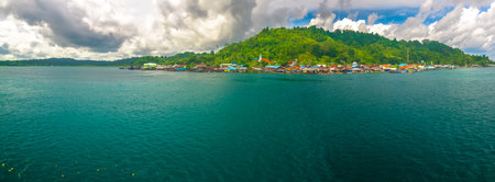 Panorama of Sikakap Island, Sipora, in the beautiful Mentawai Islands district. The row of simple...