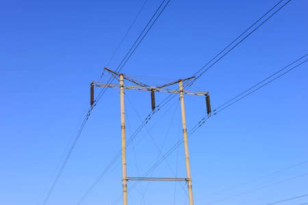 Isolated pole under the blue sky, close-up