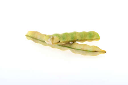 Fresh peas isolated on a white backgroundの写真素材