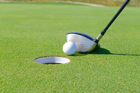 golf ball on the grass, close-up