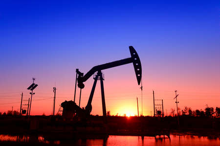 Beam pumping unit in the workの写真素材