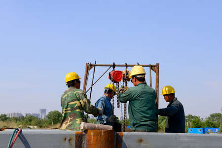 Workers work in the construction siteのeditorial素材