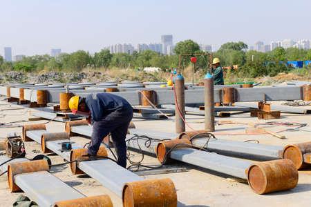 Workers work in the construction siteのeditorial素材