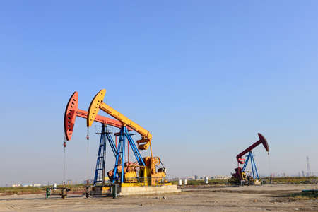 Beam pumping unit in the workの写真素材