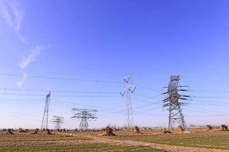 High voltage towers and blue sky