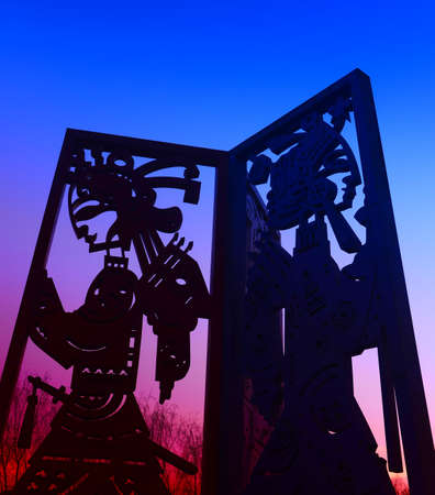 Shadow play sculpture silhouette in the setting sunのeditorial素材