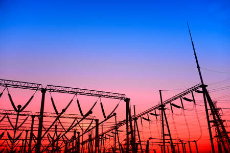 High piezoelectric towers, in the setting sun  の写真素材