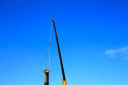 The crane is working in the air の写真素材