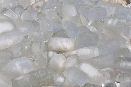 Lots of ice stacked together, outdoors
