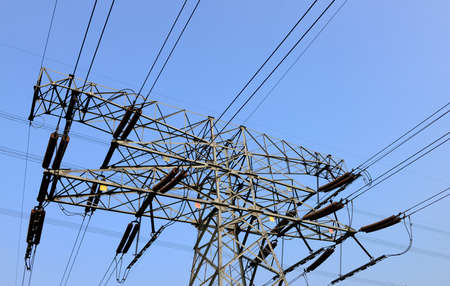 High piezoelectric tower in the background of blue skyの写真素材