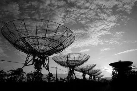 The observatory in the evening,The silhouette of a radio telescopeの写真素材