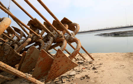 iron anchors, by the seaの写真素材