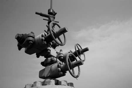 Oil pipes and switches in the skyの写真素材