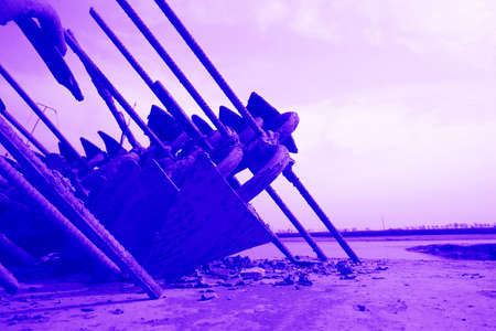 Many iron anchors, by the seaの写真素材