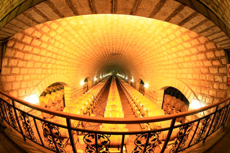 Wine barrels stacked in the cellar of the wineryのeditorial素材