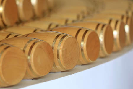 Wine barrels stacked in the cellar of the winery