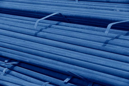 a pile of iron pipesの写真素材