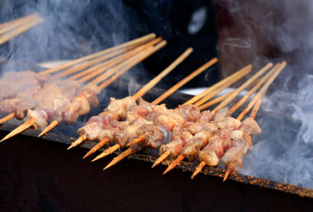 Close-up of lamb kebabs, outdoors,の写真素材