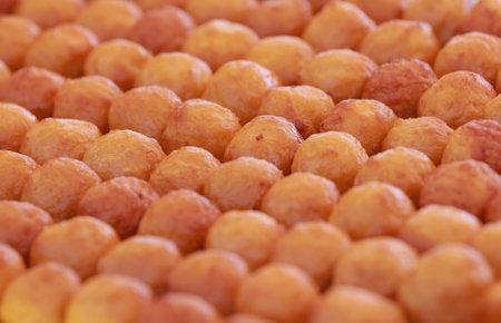 Lots of fried meatballs, laid out togetherの写真素材