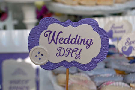 elements of the wedding d cor. The plate with an inscription on a stick. wedding table decorationの写真素材