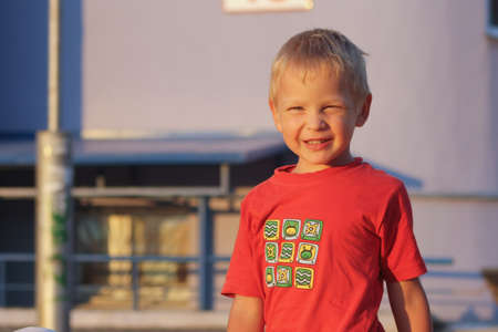 The boy with a smile has blinked the eyesの写真素材