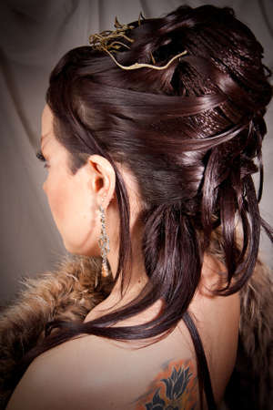 The girl with a hairdress turned awayの写真素材