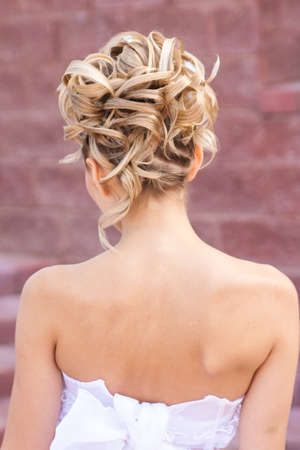 Back view of elegant wedding hairstyle in streetの写真素材