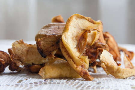 Slices of dried apple on retro backgroundの写真素材
