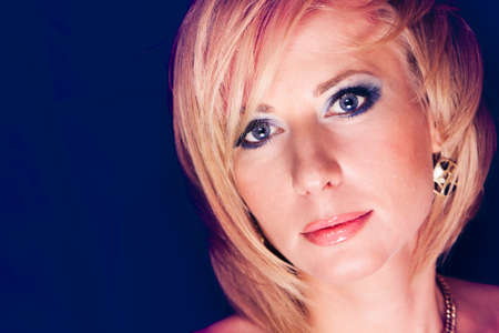 Blond Hair  Beautiful Sexy Blonde Girl  Beauty isolated on a Black Backgroundの写真素材