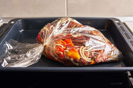Roast in the oven in a plastic bagの写真素材