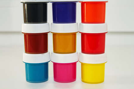 Tins with paint colorful stand on each otherの写真素材