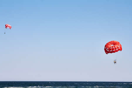Parachuting at sea, Parasailing with a boat over the seaの写真素材