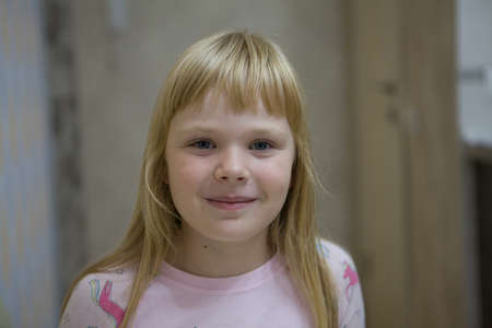 Little girl at home smilingの写真素材
