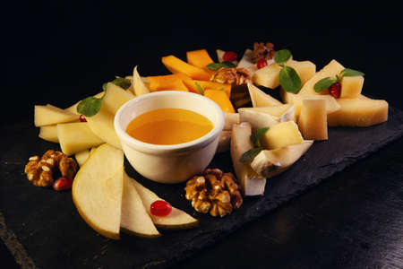 Assorted fruit on a black backgroundの写真素材