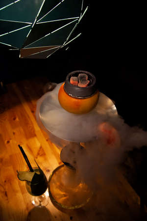 Hookah or shisha hot coals, dark black smokeの写真素材