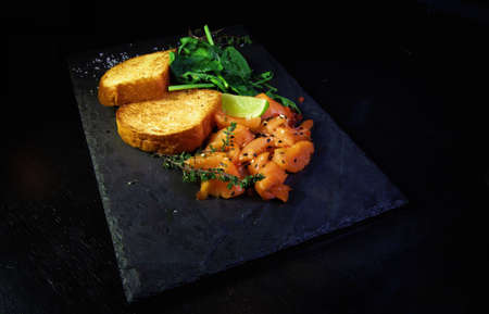 Smoked Salmon with waffles, Healthy breakfast , Served with fresh lemon.の写真素材