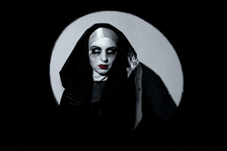 A terrible image of a nun for the holiday Halloweenの写真素材