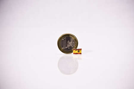 one Euro Coin with some european flagsの写真素材