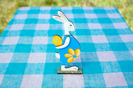 easter bunny with egg on the table