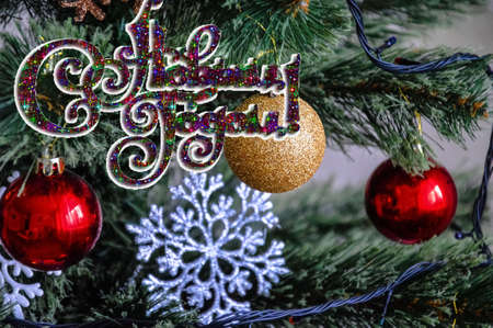 Blank for a New Year and Christmas greeting card with a Christmas tree and toysの写真素材