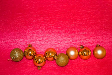 New Year's composition. Christmas decorations on a red background. Flat lay, top viewの写真素材